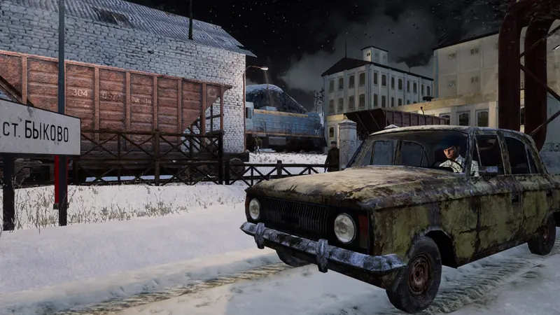 Snow-covered Bykovo station with an abandoned Moskvich by the platform